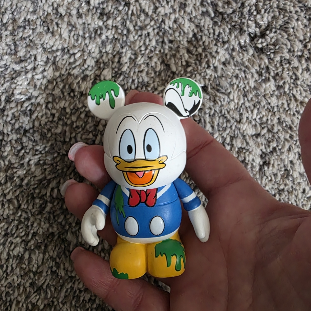 Disney Vinyl Figure - Blue, Yellow, Green, and Red